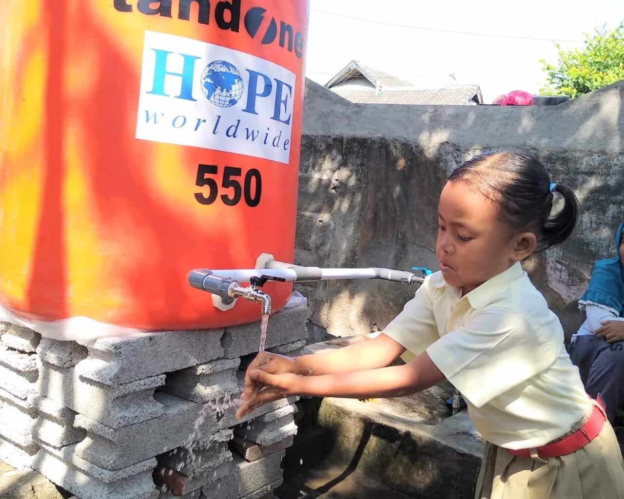 Clean Water Facility: community water tank & 4 public toilet